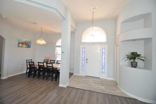 Palm Harbor House | Sunset Bay Beautiful Pool Home - Bring Your Boat or Jet Ski - Canal with Dock- Sleeps 10 - 4 BD