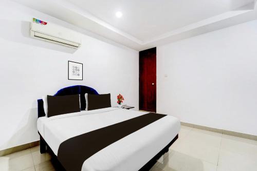 Kunnamangalam Hotel | Super Hotel O Kunnamangalam Near Bus Stand