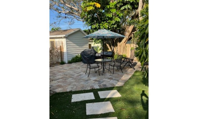 Mango Groves Cottage | Surf Inn our Beachy Cottage- King Bed w/Fenced Patio