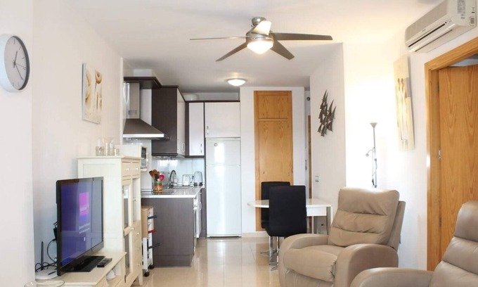 La Envia Apartment | Swimming pools, gym, library and golf course. Wifi in common areas. Heated swimming pool.