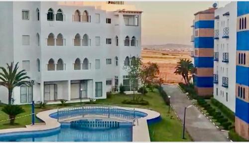 Briech Apartment | TANGER/ASILAH: APPART 50m2 FACE MER ET PISCINES, 5 PLACES, TOUT ÉQUIPÉ+WIFI+CLIM