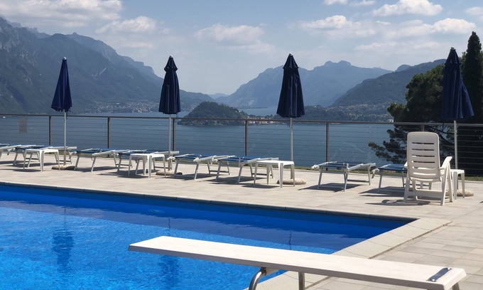 Menaggio Condo | Terraces apartment[2km from center]spectacular lake view, pool. Parking