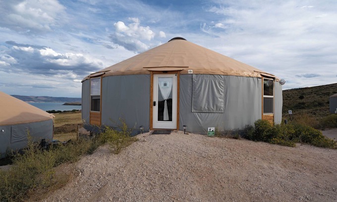 Garden City RV Rental | The Black Bear Yurt: Rustic Hilltop Escape with Stunning Bear Lake Views – Sleeps 12!