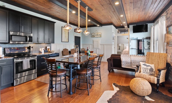 South Haven Condo | The Black Pearl: industrial condo sleeps 6, full size kitchen & scenic views!