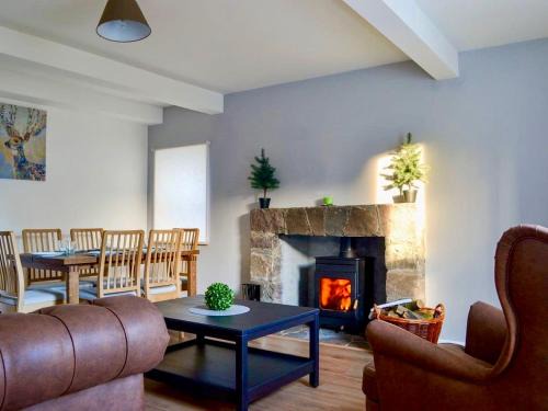 Strathcarron House | The Coolins cottage with wood burner