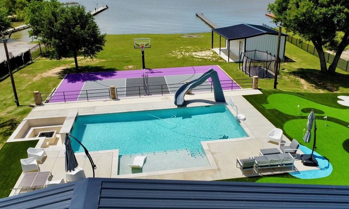 Pelican Bay House | The Grand Pelican - LakeFront W/ Pool, Sport Court, Fire Pit