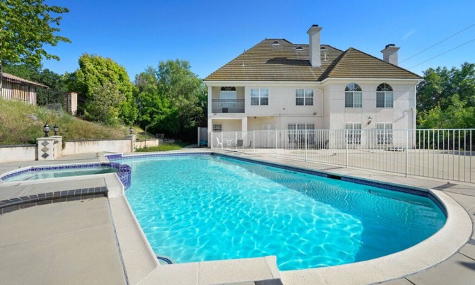 Covina House | The Hillside Sanctuary Pool: 6 bedrooms, with fitness area, and wide backyard
