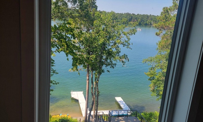 Nevis House | The Lookout on Lake Belle Taine ~ Luxury, Hot Tub, Sleeps 16, Lake & Trail Front