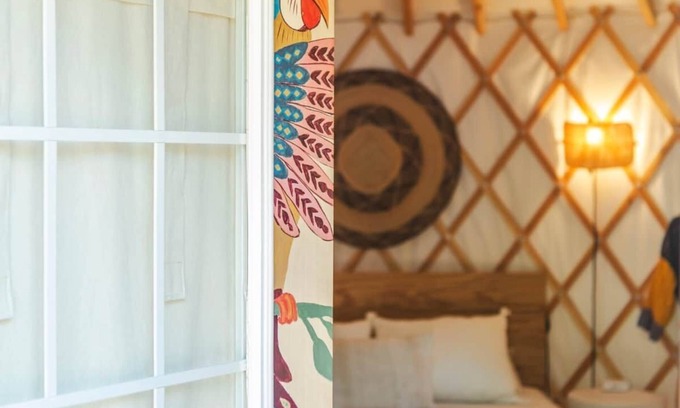 Lakeway House | The Macaw yurt