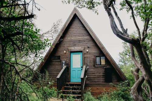New Braunfels Ski Chalet | The Maverick: A-Frame w/Hammock and Tree Top View