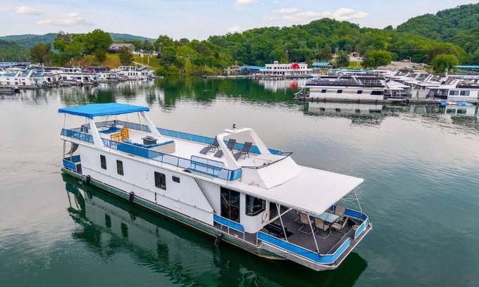 Allons Boat Rental | The Stillwater Houseboat 75' - Medium Houseboat, 6 bedrooms,waterslide, fireplace on rooftop lounge area
