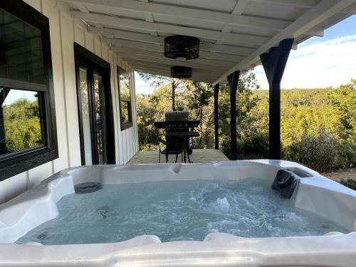 Wimberley House | The Ultimate Romantic Getaway: Charming Cabin with a Hot Tub in Wimberley, Texas