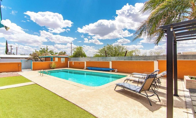 The Garden District Apartment | This centrally located 1 bedroom features a full size pool and electric vehicle charging on site.