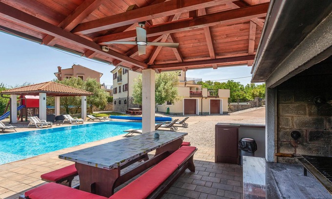 Sveti Vid Dobrinjski House | This charming vacation home is located in a small village in the middle of the island of Krk.
