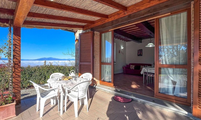 Monte Santa Maria Tiberina House | This pretty vacation home welcomes you with a sweeping view of the countryside.