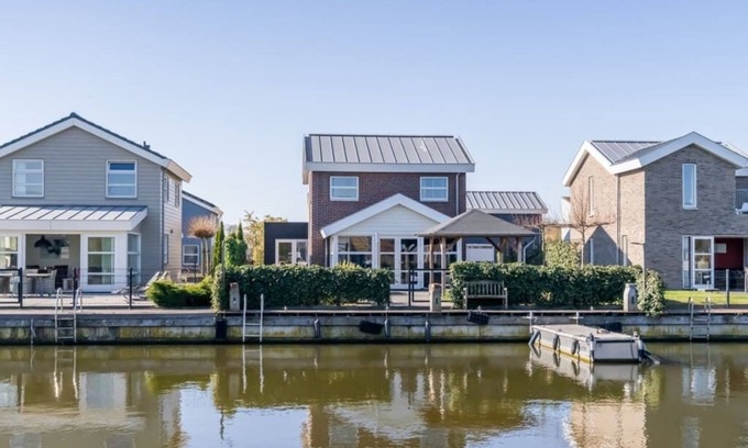 Oude-Tonge House | Tough and industrial with lots of space around the house for storing your fishing or cycling equipme