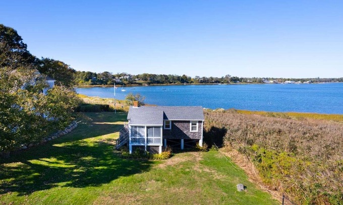 Orleans House | Town Cove Cottage: 056-OT Charming Waterfront Cottage on Town Cove – Orleans