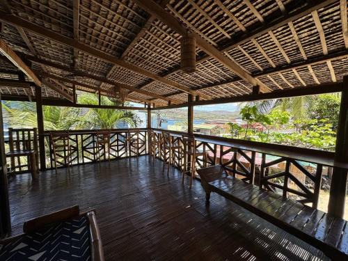 Mabini Hotel | Tranquil Getaway Lilly Room, Dahlia Room, Aster Room and Poppy Room & Dive Center