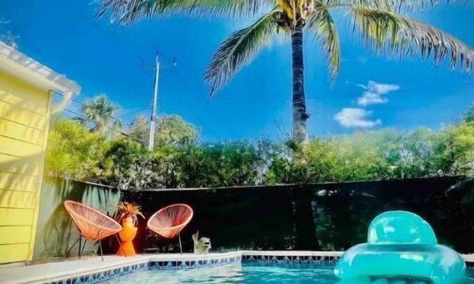 Parrot Cove House | Tropical Paradise, Beautiful Pool Home.