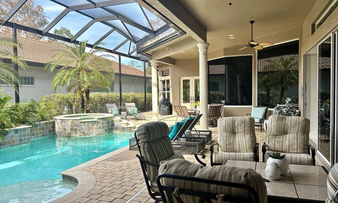 Longshore Lake House | Tropical Retreat - pet friendly 3 bedroom 3 bath home with pool and hot tub.