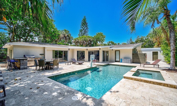Bay Isle House | Tropical Siesta Key Home with Incredible Pool, Hot Tub, and Patio!