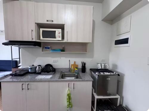 Binan City House | Tulip Garden Apricot Southwoods Binan 1BR with Pool & gym