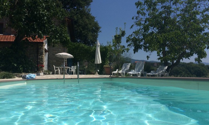 Poppi House | Tuscan farmhouse on own hill, peaceful, pool, terrace, views, Wi-Fi, cleanair
