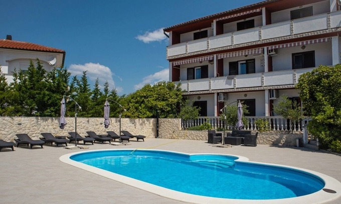 Lopar Apartment | Two bedroom apartment with balcony Lopar, Rab (A-22978-b)