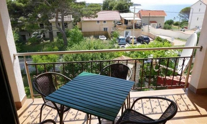 Banjol Apartment | Two bedroom apartment with balcony and sea view Banjol, Rab (A-22362-b)