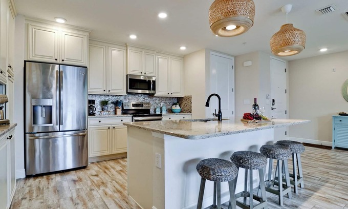 Whitney Beach Condo | Two bedroom luxury resort condo near AMI, pet friendly and elevator.