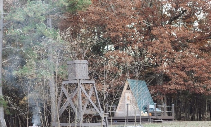 Kingston RV Rental | Two cozy pods with water tower
