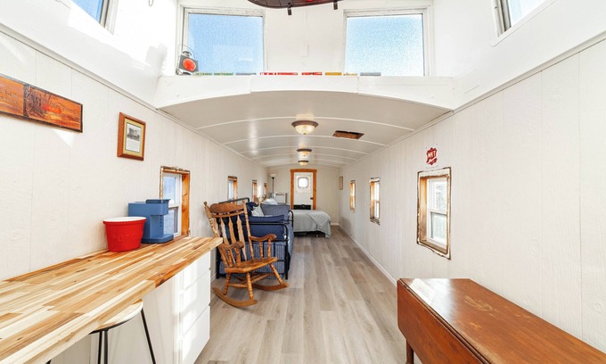 Hartsburg Cottage | Unique traincar stay at the Katy Caboose!