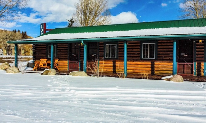 Dubois Cabin | Unwind in a Deluxe Queen Room with Scenic Riverfront and Serene Mountain Vistas.