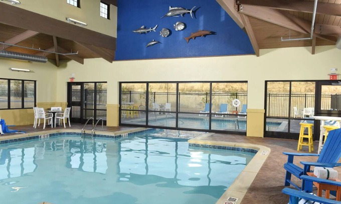 Broken Arrow Hotel | Unwind in Style: Spacious Suites & Relaxing Poolside Retreat | 4 Units