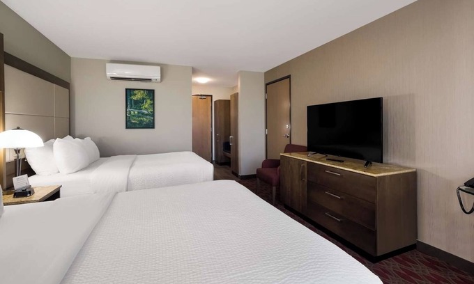 Calgary Hotel | Unwind with Ease: 2 Convenient Rooms, Indoor Swimming Pool, and Free Shuttle