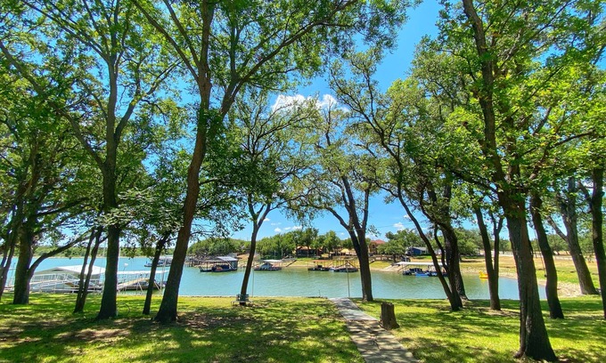 Brownwood House | Updated Shady Lakeside Retreat on Lake Brownwood with Large Boat Dock