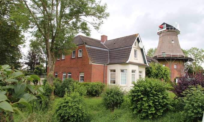 Uttum Apartment | Uttumer Mühle: Aletta - Gemütliche Erdgeschosswohnung im Müllerhaus der Uttumer Mühle