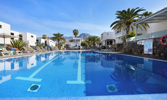 El Madronal Apartment | Vacation Apartment "Bungamerica272" with Shared Pool, Private Terrace & Wi-Fi