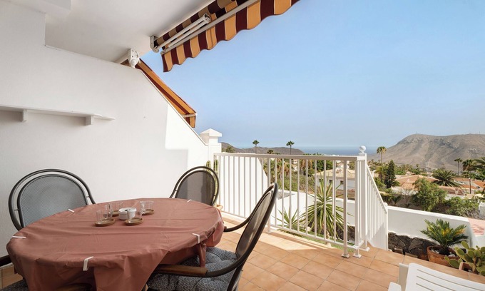 Chayofa Apartment | Vacation Apartment 'Isabel Vista Sur' with Sea View, Shared Pool and Wi-Fi