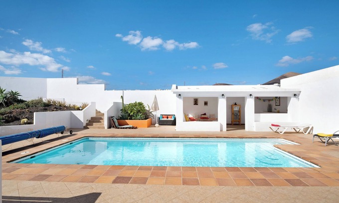 Tias House | Vacation Home "Casa Sol y Mar Tías" with Sea View, Shared Pool & Wi-Fi
