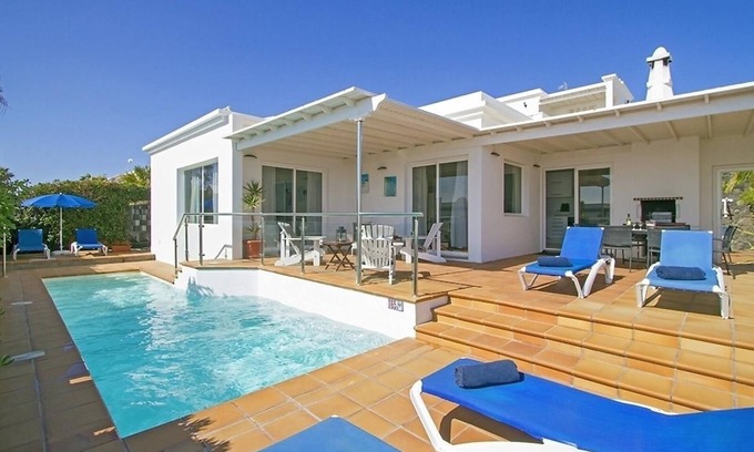 Puerto del Carmen Villa | Vacation Villa 'Benedicte' with Sea View, Wi-Fi and Air Conditioning