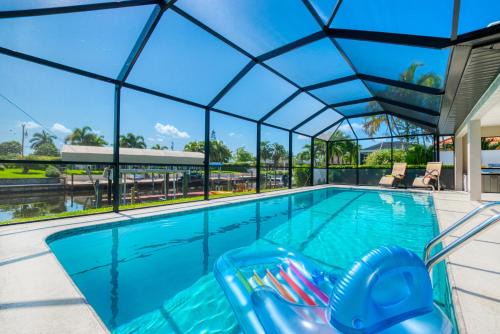Caloosahatchee Villa | VILLA BOATERS DREAM - 3 BEDS 2 BATHS - 8 GUESTS - GULF ACCESS & POOL/SPA - INCL.10% OFF BOAT RENTAL