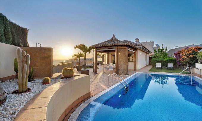 Santiago del Teide Villa | Villa 'Happy Holidays' with Sea Views, Private Pool, Garden, A/C & Wi-Fi