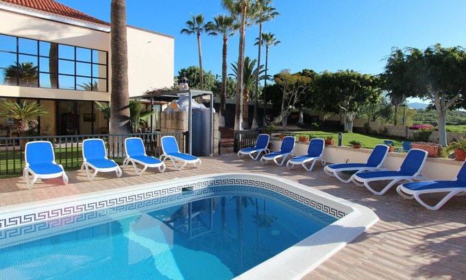 Chayofa Villa | Villa with pool for exclusive group holiday under palm trees