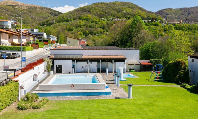 Capriasca Apartment | Villaggio Sureggio A4 mit TicinoTicket by Interhome