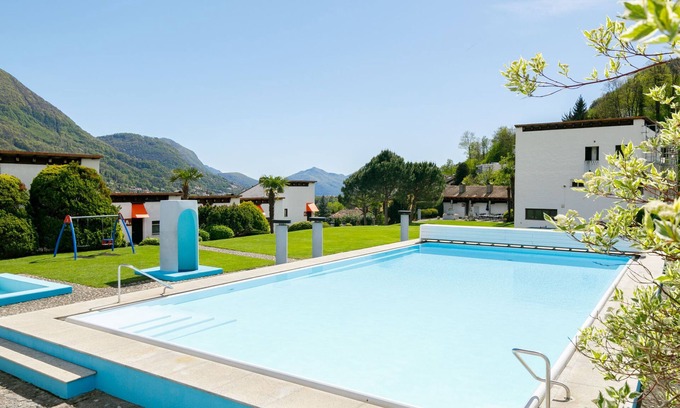 Capriasca Apartment | Villaggio Sureggio A7 mit TicinoTicket by Interhome