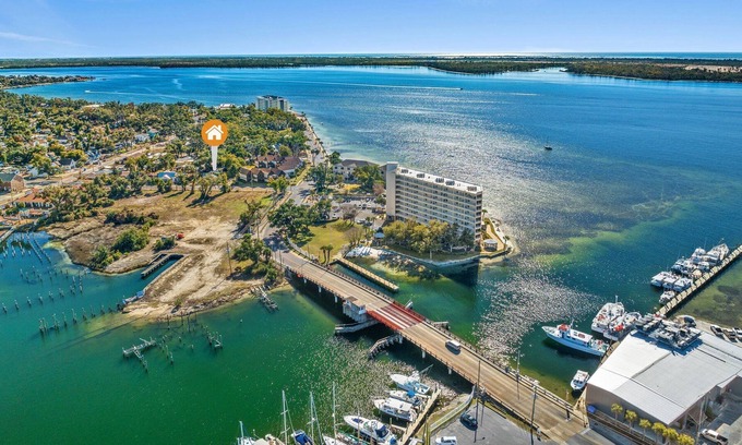 Panama City House | Watch the boats passing through Massalina Bayou from the front porch.