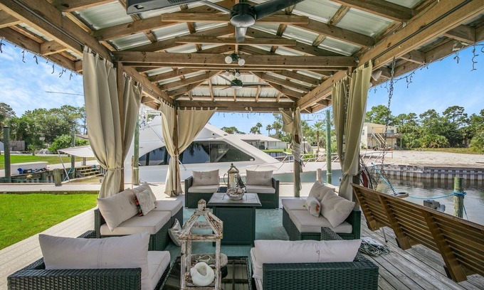 Orange Beach Villa | Water front home with boat dock, boat use, fishing swimming biking & more