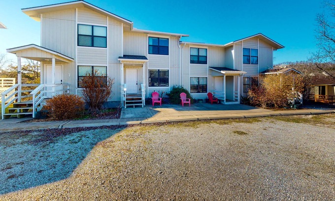 Holiday Island House | Water view townhouse with a washer/dryer, central AC, yard & grill