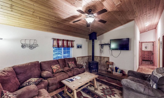 South Fork Cabin | Waterfront cabin with mountain view, wood stove, private hot tub, & WiFi